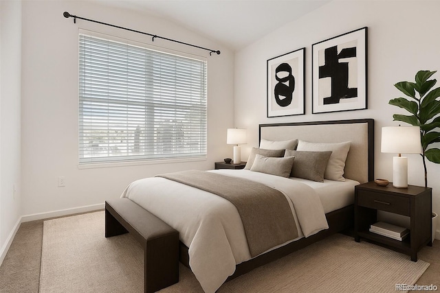 9185 Wilde Ln Unit 301, Parker, CO 80134 - bedroom featuring carpet flooring and vaulted ceiling