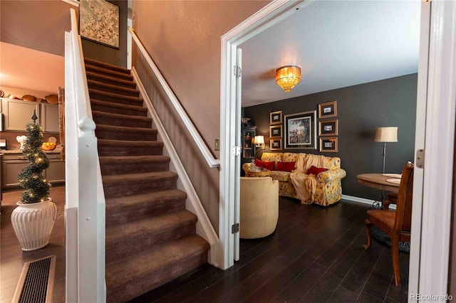 12242 Bannock Cir Unit D, Denver, CO 80234 - stairway with wood finished floors and baseboards