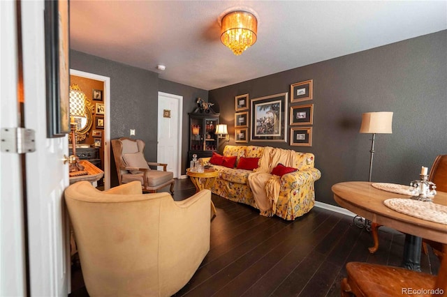 12242 Bannock Cir Unit D, Denver, CO 80234 - living room featuring wood finished floors, a textured wall, and baseboards