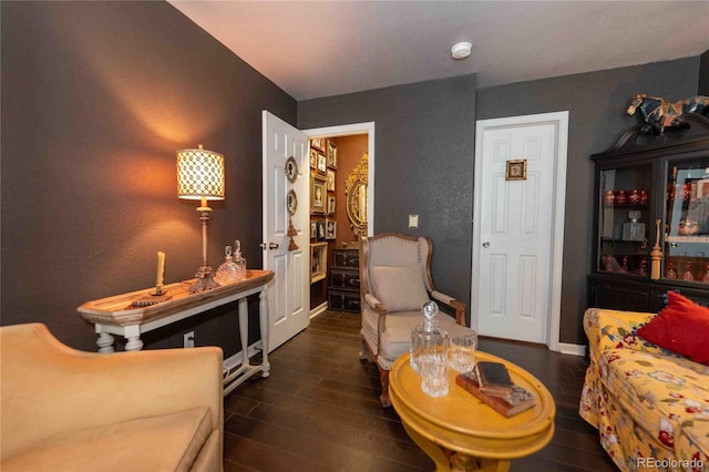 12242 Bannock Cir Unit D, Denver, CO 80234 - living room featuring dark wood-style flooring and baseboards