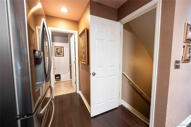 12242 Bannock Cir Unit D, Denver, CO 80234 - hall with an upstairs landing, baseboards, and dark wood finished floors
