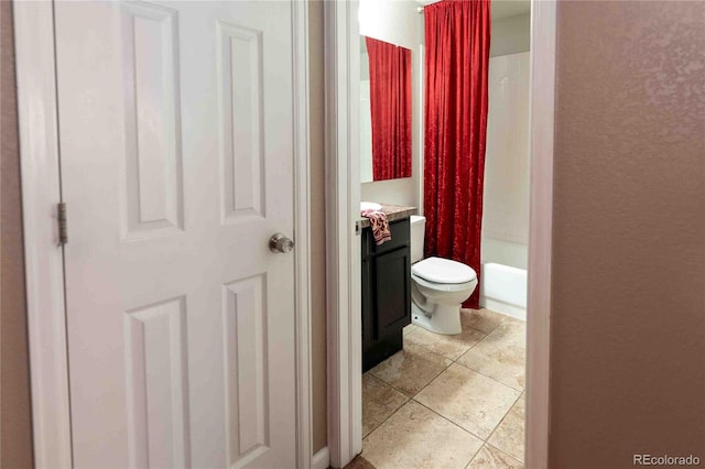 12242 Bannock Cir Unit D, Denver, CO 80234 - full bath with toilet, vanity, tile patterned floors, and shower / tub combo with curtain