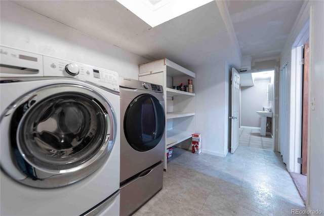 12242 Bannock Cir Unit D, Denver, CO 80234 - washroom with washer and clothes dryer