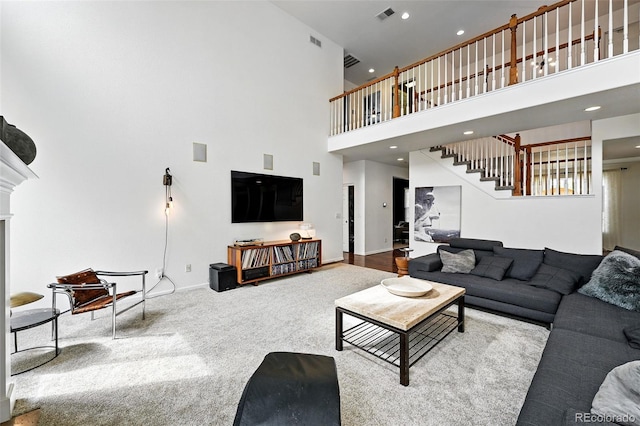 11985 Singing Winds St, Parker, CO 80138 - living area with stairs, a high ceiling, carpet, baseboards, and recessed lighting