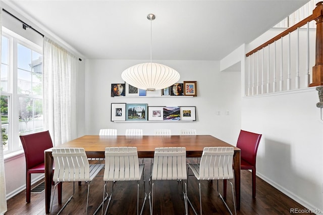 11985 Singing Winds St, Parker, CO 80138 - dining space with wood finished floors and baseboards