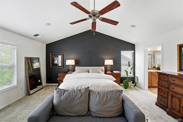 11985 Singing Winds St, Parker, CO 80138 - bedroom with vaulted ceiling, light colored carpet, baseboards, a ceiling fan, and connected bathroom