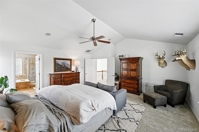 11985 Singing Winds St, Parker, CO 80138 - bedroom with lofted ceiling, light colored carpet, a ceiling fan, and connected bathroom