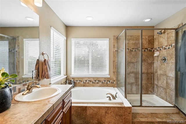 11985 Singing Winds St, Parker, CO 80138 - full bath with vanity, a bath, and a shower stall