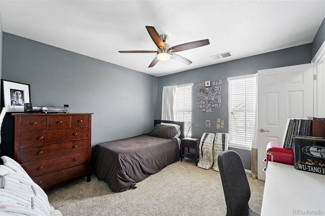 11985 Singing Winds St, Parker, CO 80138 - carpeted bedroom featuring ceiling fan