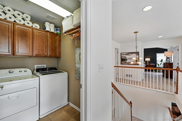 11985 Singing Winds St, Parker, CO 80138 - washroom featuring cabinet space, separate washer and dryer, baseboards, and recessed lighting