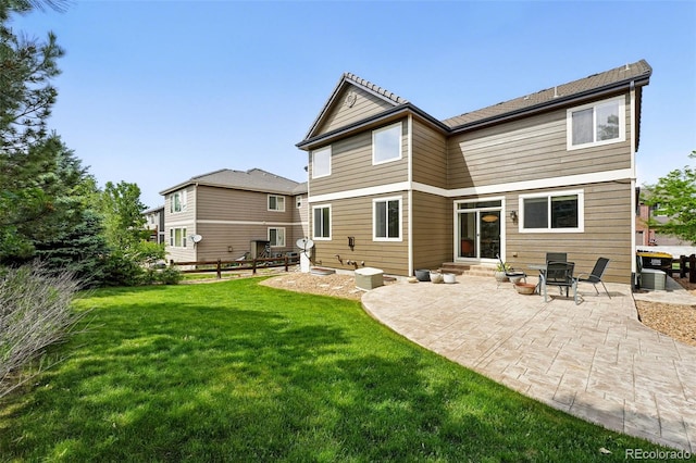 11985 Singing Winds St, Parker, CO 80138 - rear view of house with a patio area and entry steps