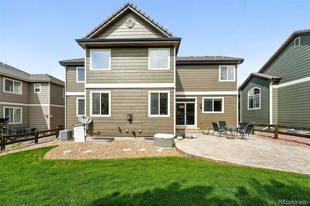 11985 Singing Winds St, Parker, CO 80138 - rear view of house with a patio and central AC