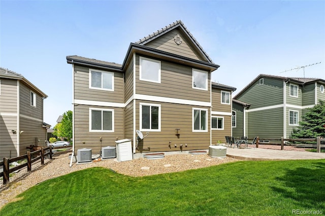 11985 Singing Winds St, Parker, CO 80138 - rear view of house with a patio and central air condition unit