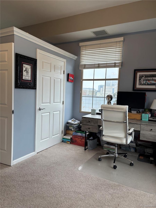 office area with baseboards, visible vents, and carpet flooring