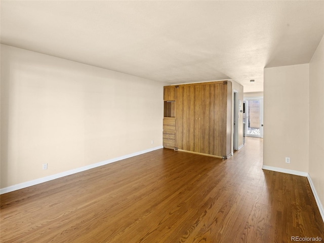 61 S Sable Blvd Unit C15, Aurora, CO 80012 - unfurnished room featuring dark wood-type flooring and baseboards