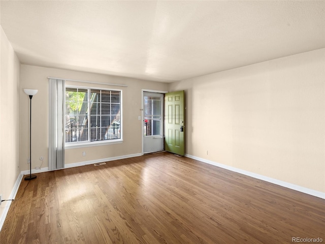 61 S Sable Blvd Unit C15, Aurora, CO 80012 - empty room featuring wood finished floors and baseboards