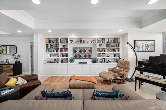 living room featuring recessed lighting, a raised ceiling, and crown molding