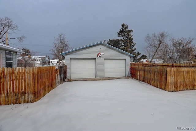 view of snow covered garage