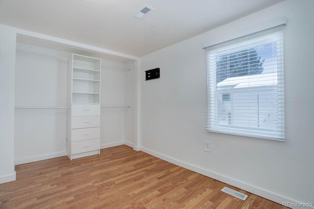 unfurnished bedroom featuring light hardwood / wood-style floors