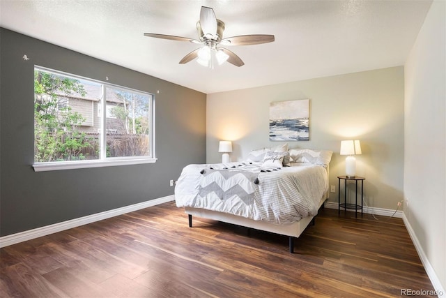 3461 Maple Cir, Brighton, CO 80601 - bedroom featuring wood finished floors, baseboards, and ceiling fan