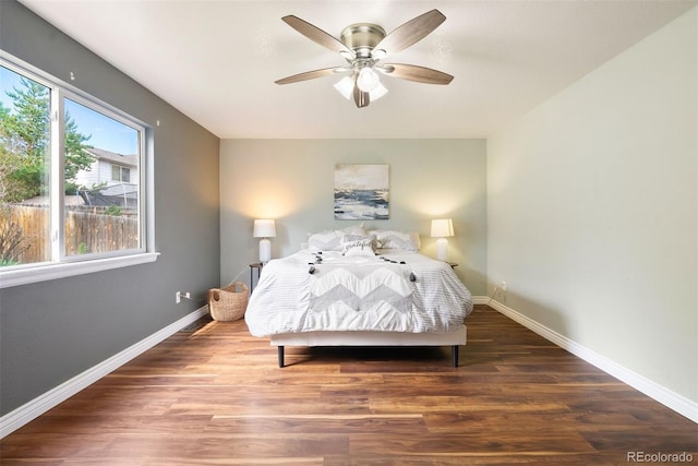 3461 Maple Cir, Brighton, CO 80601 - bedroom with baseboards, wood finished floors, and a ceiling fan