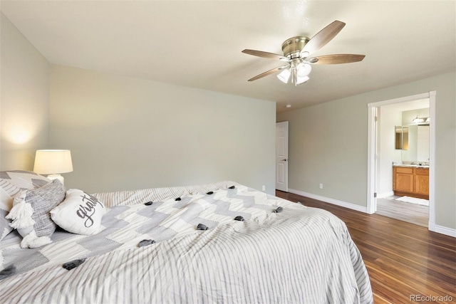 3461 Maple Cir, Brighton, CO 80601 - bedroom featuring dark wood-style floors, baseboards, ensuite bath, and a ceiling fan