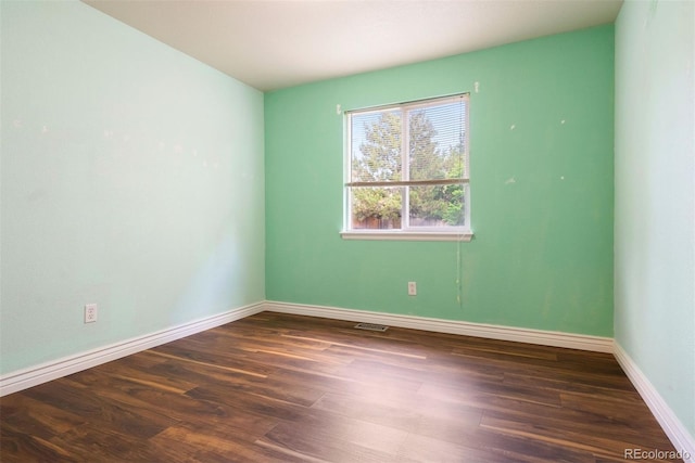 3461 Maple Cir, Brighton, CO 80601 - unfurnished room featuring wood finished floors and baseboards