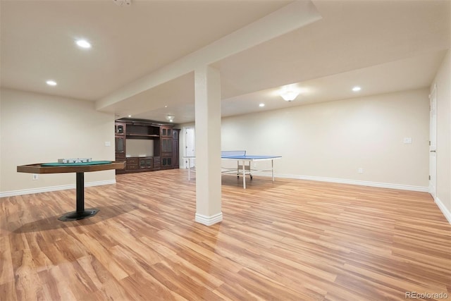 3461 Maple Cir, Brighton, CO 80601 - below grade area with light wood-style floors, recessed lighting, and baseboards