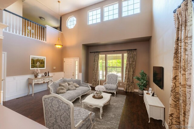 living room with dark hardwood / wood-style floors