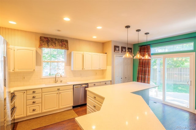 kitchen featuring white cabinetry, stainless steel appliances, dark hardwood / wood-style flooring, and sink