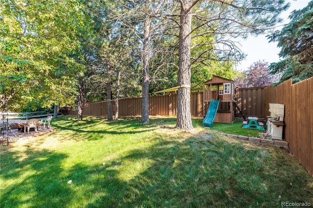 view of yard with a playground