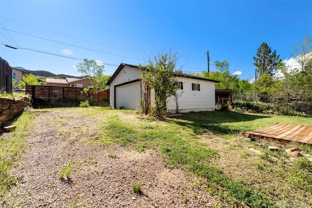 1210 Westend Ave, Colorado Springs, CO 80904 - view of yard featuring a garage and an outdoor structure