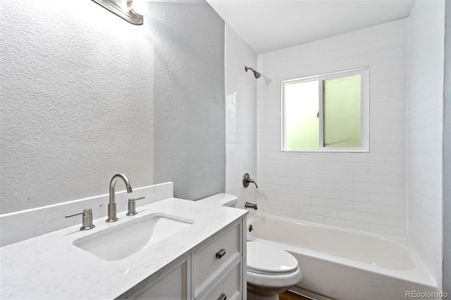 1210 Westend Ave, Colorado Springs, CO 80904 - full bathroom featuring a textured wall, vanity, and shower / tub combination