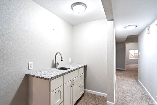 1210 Westend Ave, Colorado Springs, CO 80904 - bar area featuring a sink and carpet flooring