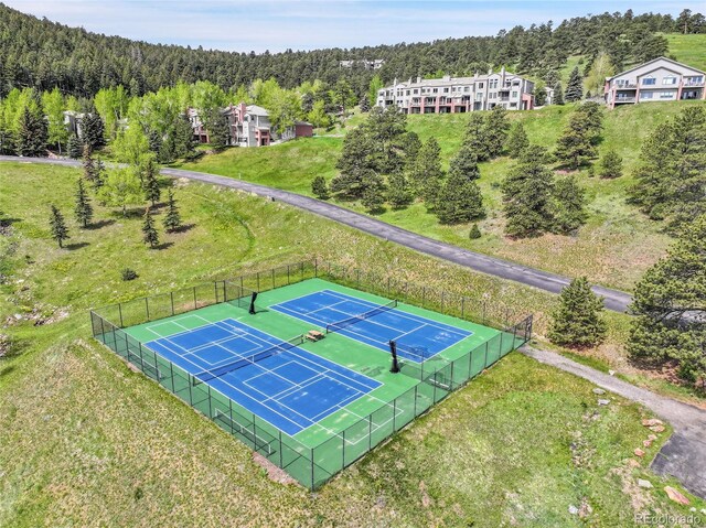 766 Chimney Creek Dr, Golden, CO 80401 - drone / aerial view of a heavily wooded area