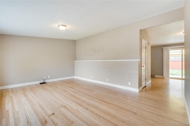 3216 Revere St, Aurora, CO 80011 - spare room with light wood-type flooring and baseboards