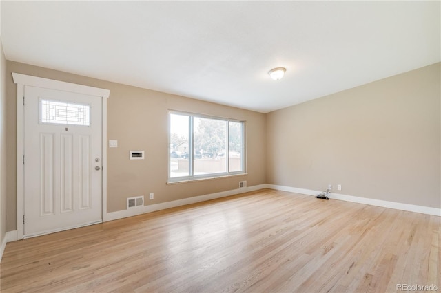 3216 Revere St, Aurora, CO 80011 - entryway with light wood-style flooring, plenty of natural light, and baseboards
