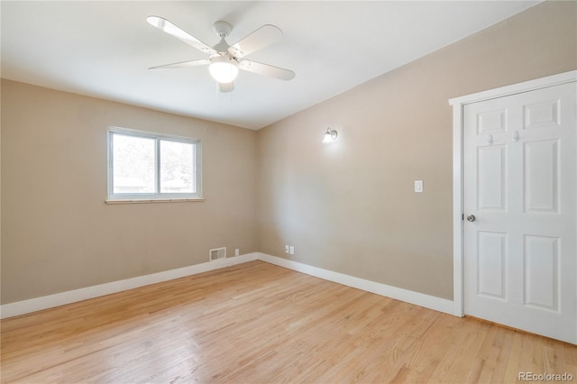 3216 Revere St, Aurora, CO 80011 - empty room featuring light wood-style floors, baseboards, and a ceiling fan