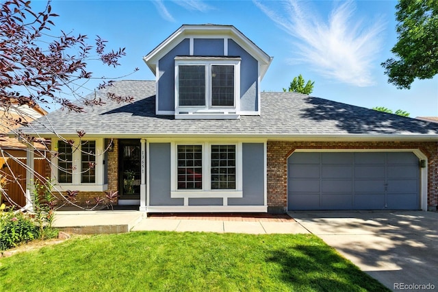 13651 W 65th Ave, Arvada, CO 80004 - view of front of home featuring a shingled roof, driveway, and brick siding