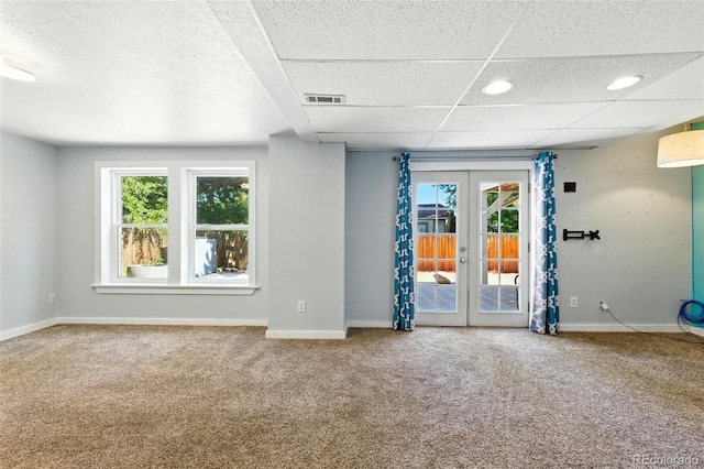 13651 W 65th Ave, Arvada, CO 80004 - carpeted spare room with french doors and healthy amount of natural light