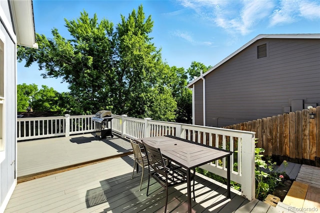13651 W 65th Ave, Arvada, CO 80004 - wooden deck with outdoor dining space