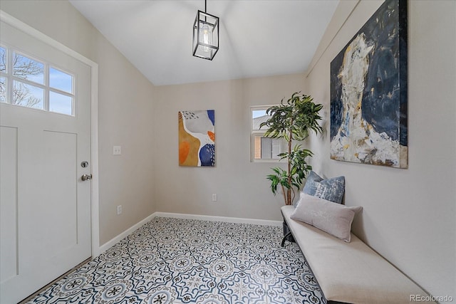 sitting room featuring tile patterned floors and baseboards