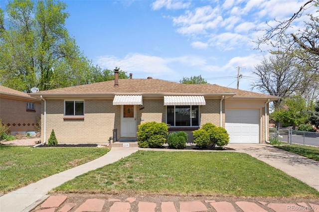 ranch-style home featuring an attached garage, driveway, and brick siding
