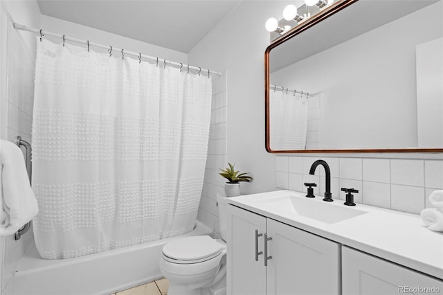 full bath featuring tasteful backsplash, shower / tub combo, toilet, and vanity