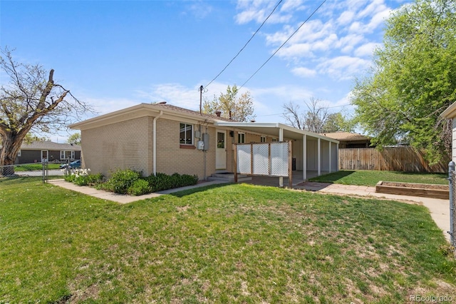 rear view of property featuring brick siding