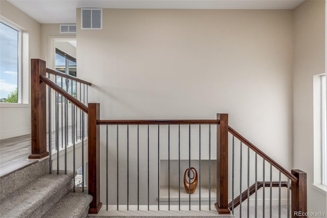 6761 Alan Dr, Denver, CO 80221 - staircase with baseboards