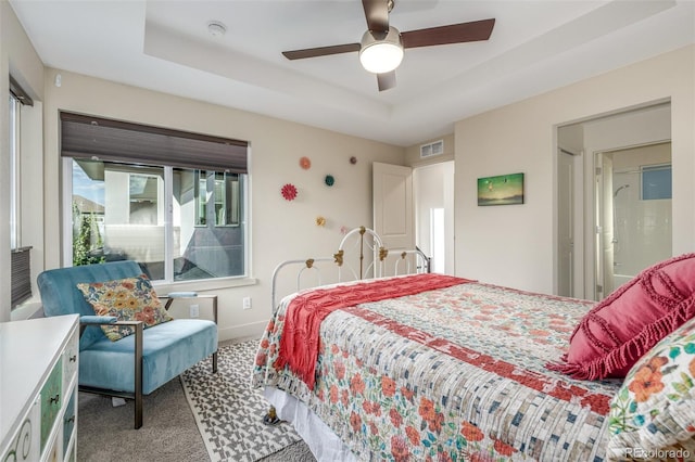 6761 Alan Dr, Denver, CO 80221 - bedroom with carpet, a raised ceiling, and a ceiling fan