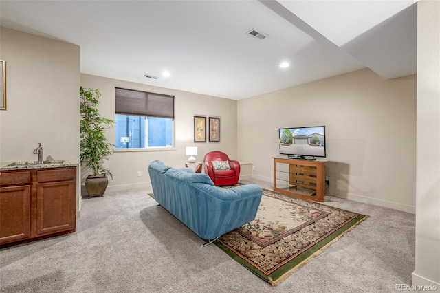 6761 Alan Dr, Denver, CO 80221 - living room with light colored carpet and recessed lighting
