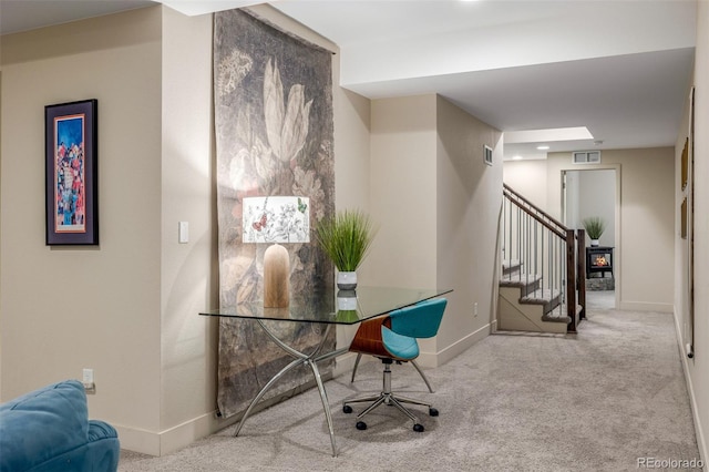 6761 Alan Dr, Denver, CO 80221 - home office with carpet and baseboards