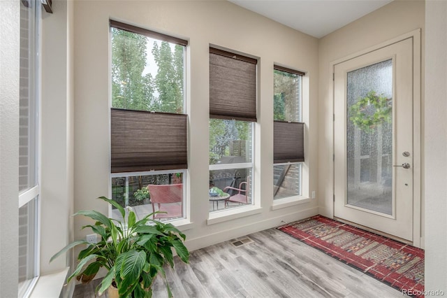 6761 Alan Dr, Denver, CO 80221 - doorway featuring wood finished floors